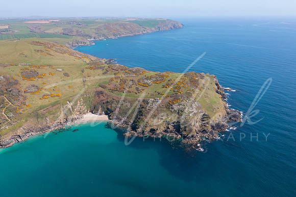 aerial photograph of Lantic Bay, Cornwall, England.