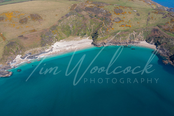 aerial photograph of Lantic Bay, Cornwall, England.